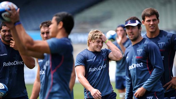 Melbourne Rebels new recruit James O'Connor and his teammates at a training session yesterday.