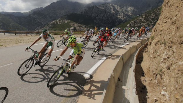 Tight turn: Slovakia's Peter Sagan (green jersey) leads Cadel Evans (red jersey) down the Vizzavona pass in the second stage on Corsica.