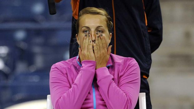 Russia's Anastasia Pavlyuchenkova waits for the rain to stop in order to play Serena Williams.