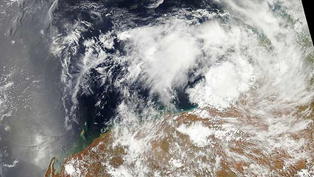 Tropical Low north-east of Port Hedland, tracking west-south-west.