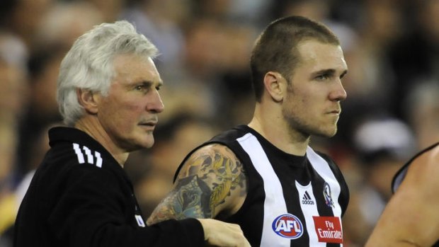 Straightened out ...  Mick Malthouse, left, helped put  Dane Swan, right, on the right path.