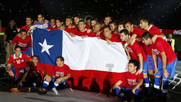 Chilean players celebrate after defeating Ecuador.