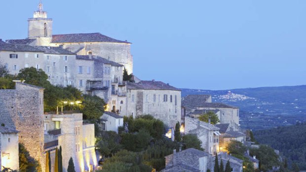 The slow road ... scaling the near-vertical track up to the battlements at Gordes, Provence, is a challenge.