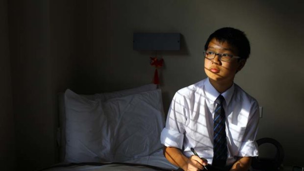 Ink to the past ... Knox Grammar School student Alex Li regularly writes letters to his family in Hong Kong instead of using Skype or texting.