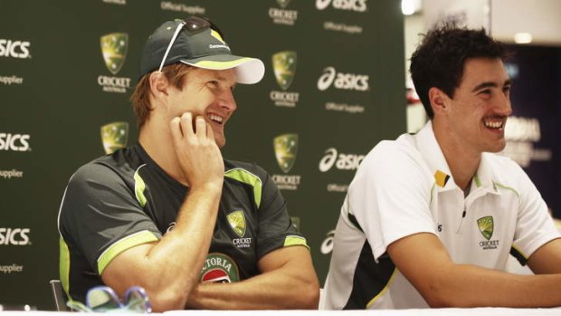 Jovial mood: Shane Watson and Mitchell Starc laugh during a store appearance at Sydney's Queen Victoria Building on Saturday.