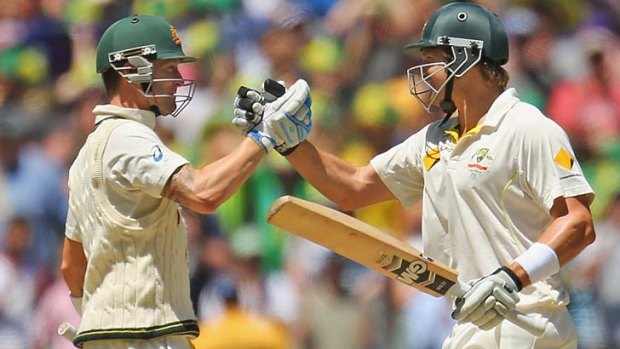 Michael Clarke and Shane Watson shake hands after the Test win.
