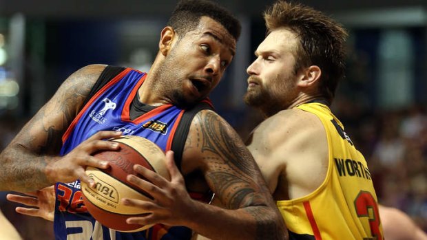 BJ Anthony of the 36ers secures the ball in his side's game-three win over the Melbourne Tigers.