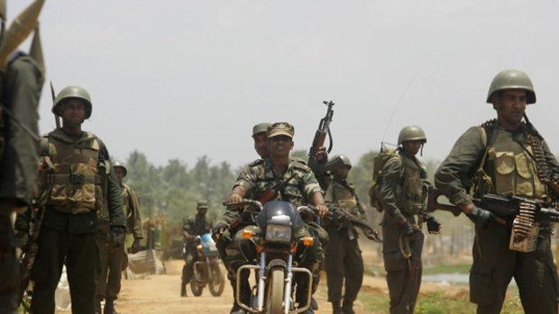 Final push: Government troops head to the war zone in Sri Lanka's north-east.