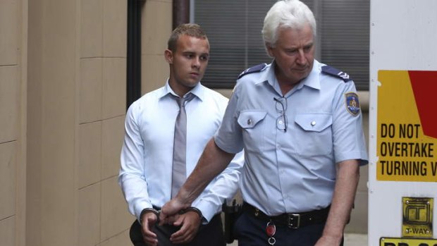 Kieran Loveridge is escorted from the NSW Supreme Court after receiving five years and two months sentence for the manslaughter of Thomas Kelly.