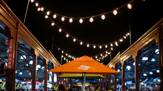 The Summer Night Market at Queen Victoria Market has 60 food stalls and bars, 100 specialty stalls plus live music and games 
