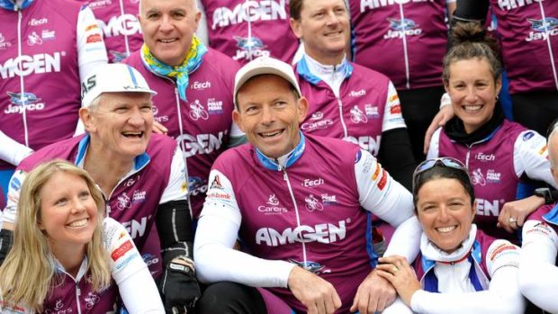 Tony Abbott on Pollie Pedal last year before the 2013 election. The charity that benefits from the ride has criticised the government's planned changes to the welfare sector.
