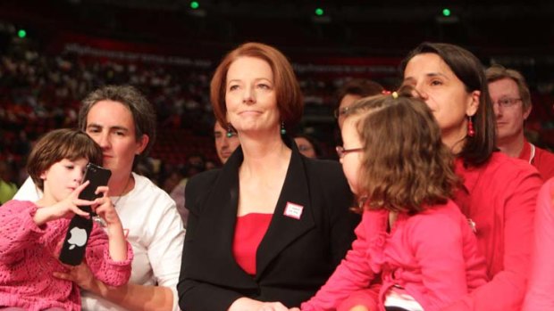 A helping hand ... there was plenty of support for Julia Gillard at a rally in Sydney yesterday when she announced funding will be put aside in the budget for a national disability insurance scheme - one year earlier than planned. Ms Gillard said it will be trialled at selected sites and serve 10,000 people with a disability from July next year.