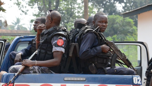 Facing inter-ethnic clashes ... Police officers arrive to patrol in the streets of Bangu, Central African Republic in 2012.