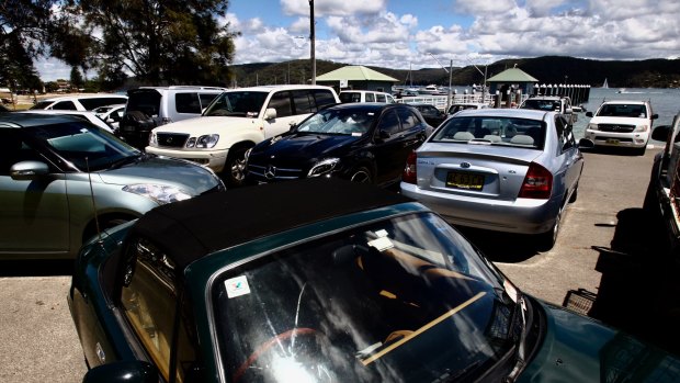 Cars that ate Palmy: a packed car park near the Pittwater Park Wharf.