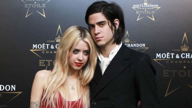 Peaches Geldof (left) and husband Thomas Cohen pose for photographers at the Park Lane Hotel in London, England in 2011. The couple have two children under two years old.