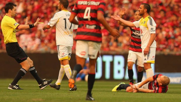 Returning from injury: Western Sydney's Aaron Mooy (right) has been named in the Wanderers squad to tackle Adelaide.