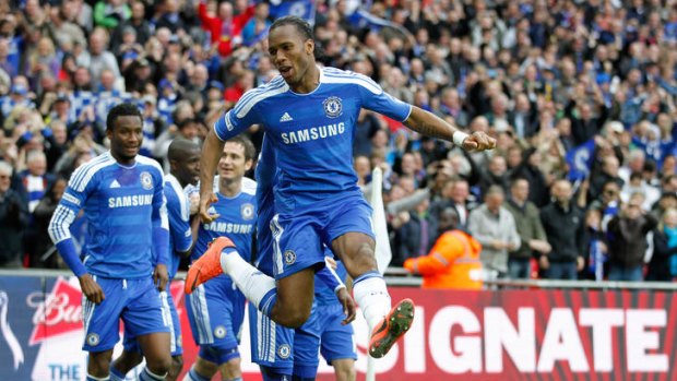 Chelsea striker Didier Drogba celebrates scoring their second goal during the FA Cup final  between Liverpool and Chelsea.