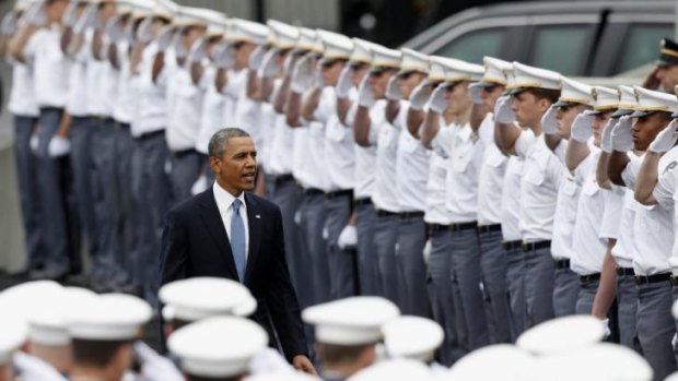 Massed ranks: Barack Obama arrives at the graduation ceremony at the US Military Academy in West Point, where he gave the commencement address.