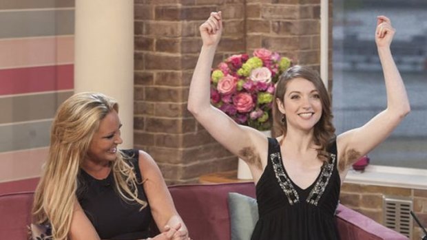 Emer O'Toole shows off her under arm hair on morning TV in the UK.