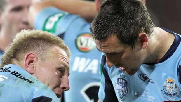 Luke Lewis and Mitchell Pearce put their heads together after the game.