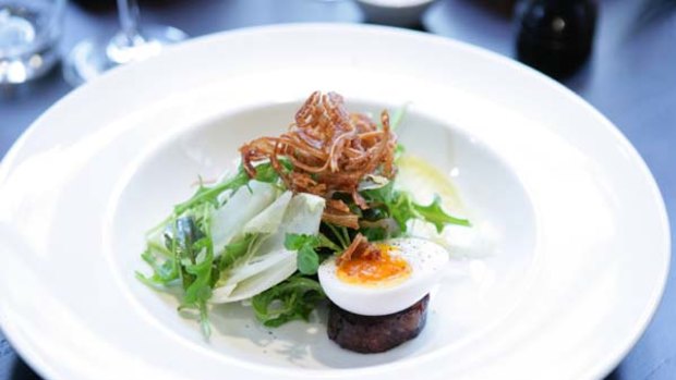 Black sausage, organic eggand crispy pig's ear salad, $18.