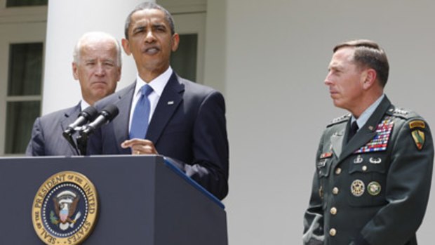 President Barack Obama, flanked by General David Petraeus and Vice President Joe Biden, announces Petraeus as the replacement for General Stanley McChrystal.