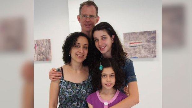 Perth woman mother-of-two May Ali, her husband Dr John Bussell, and daughters Nadine, 14, and Anya, 11.