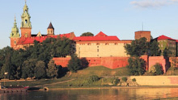 Gothic charm ... the cathedral and castle atop Wawel Hill; (right) the Market Square.