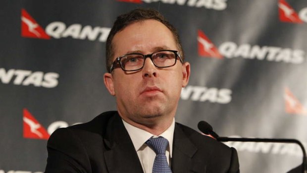 Qantas chief executive officer Alan Joyce announces the restructure.