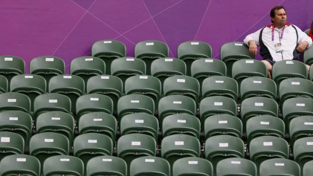 Empty seats ... a spectator watches a women's singles tennis match.