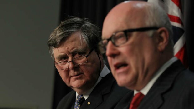 Attorney-General George Brandis, right, and ASIO chief David Irvine argue enhanced powers are needed to combat terorrism.