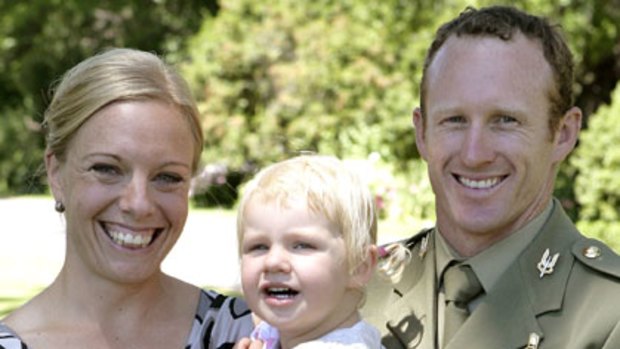 Trooper Mark Donaldson VC with his wife Emma Donaldson and their daughter Kaylee.