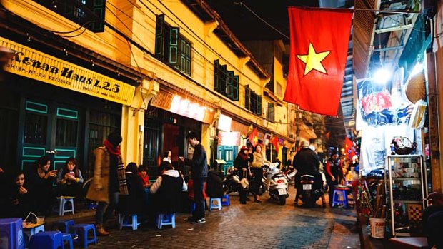 Laidback: A busy night in Hanoi's old town.
