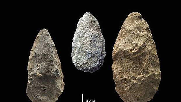 A photo of older, more archaic handaxes used by early humans in East Africa, before 320,000 years ago. image source Human Origins Program / Smithsonian