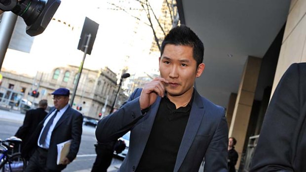 Xing Jin leaves Melbourne Magistrates Court on Wednesday after being granted bail.