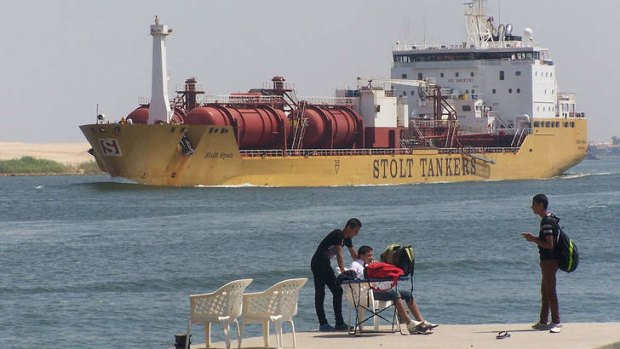 A tanker ship sails through the Suez Canal near the port city of Ismailia in Egypt. A container ship in the Suez Canal was the target of a failed "terrorist" attack on August 31.