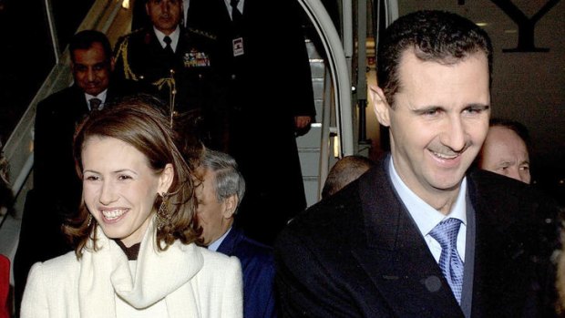President Bashar Assad of Syria and his wife Asma arrive at London's Heathrow Airport in 2002.