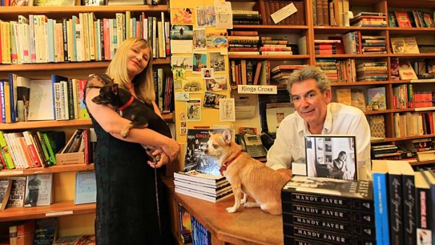 Love of literature: Author Mandy Sayer, her dog Coco and Richard Stern at the Macleay Bookshop in Potts Point.