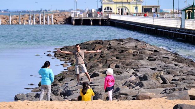 Shorts weather: A warm Father's Day on the first day of spring followed a mild and wet winter in Melbourne that broke records.