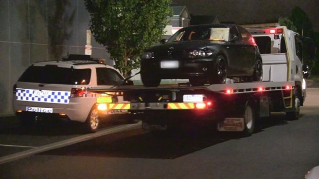 Police seize a BMW believed to have been used in a hit-run that has left a 13-year-old girl critically injured.