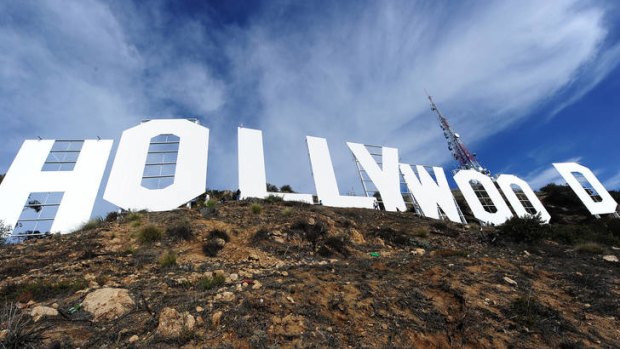 The freshly painted Hollywood sign is unveiled.
