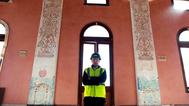 Italian intricacies &#8230; City of Sydney's architecture design manager, Chris McBride, with the discovery at Glebe Town Hall.