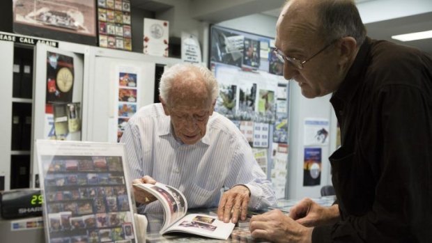 Policeman and stamp enthusiast Paul Howden, right, with dealer Max Stern at his shop.