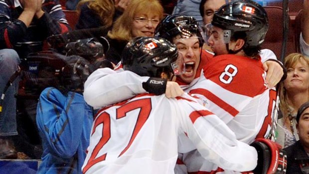 Sidney Crosby celebrates Canada's overtime gold medal win over the US in 2010.