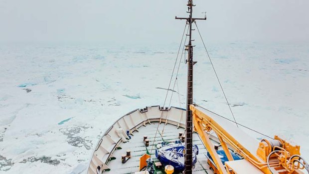 This image taken by passenger Andrew Peacock shows a thin fresh coat of snow on the trapped ship MV Akademik Shokalskiy as it waits to be rescued.