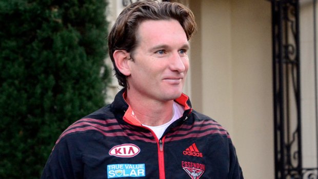 James Hird leaves his Toorak home on Thursday morning. The Bombers have dismissed Dean Robinson's claims about the coach's conduct as 'outrageous'.