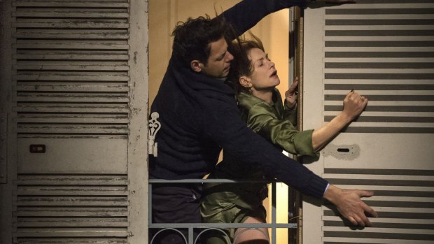 Laurent LaFitte with Isabelle Huppert, who decides to put herself in harm's way, in <i>Elle</i>.
