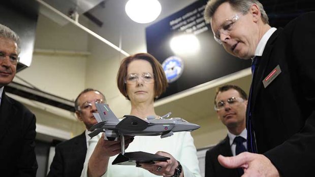 Winging it  ... Julia Gillard at  the BAE systems factory in Adelaide today.