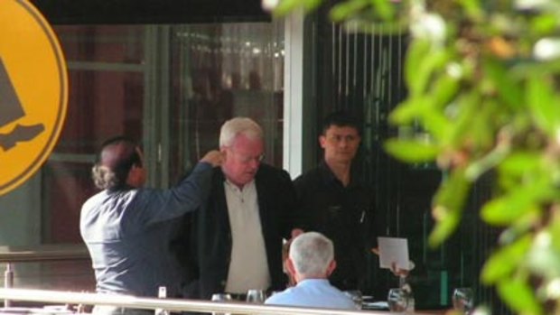 Meals and deals...the owner of the Tuscany restaurant, Frank Molo (with ponytail), Graham Richardson and developer Ron Medich 9with back to camera) at lunch in May last year.