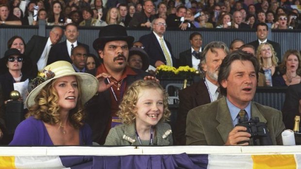 Running for us: Kurt Russell, Dakota Fanning and Elisabeth Shue star in <i>Dreamer</i>, cheering on their horse Sonador.
